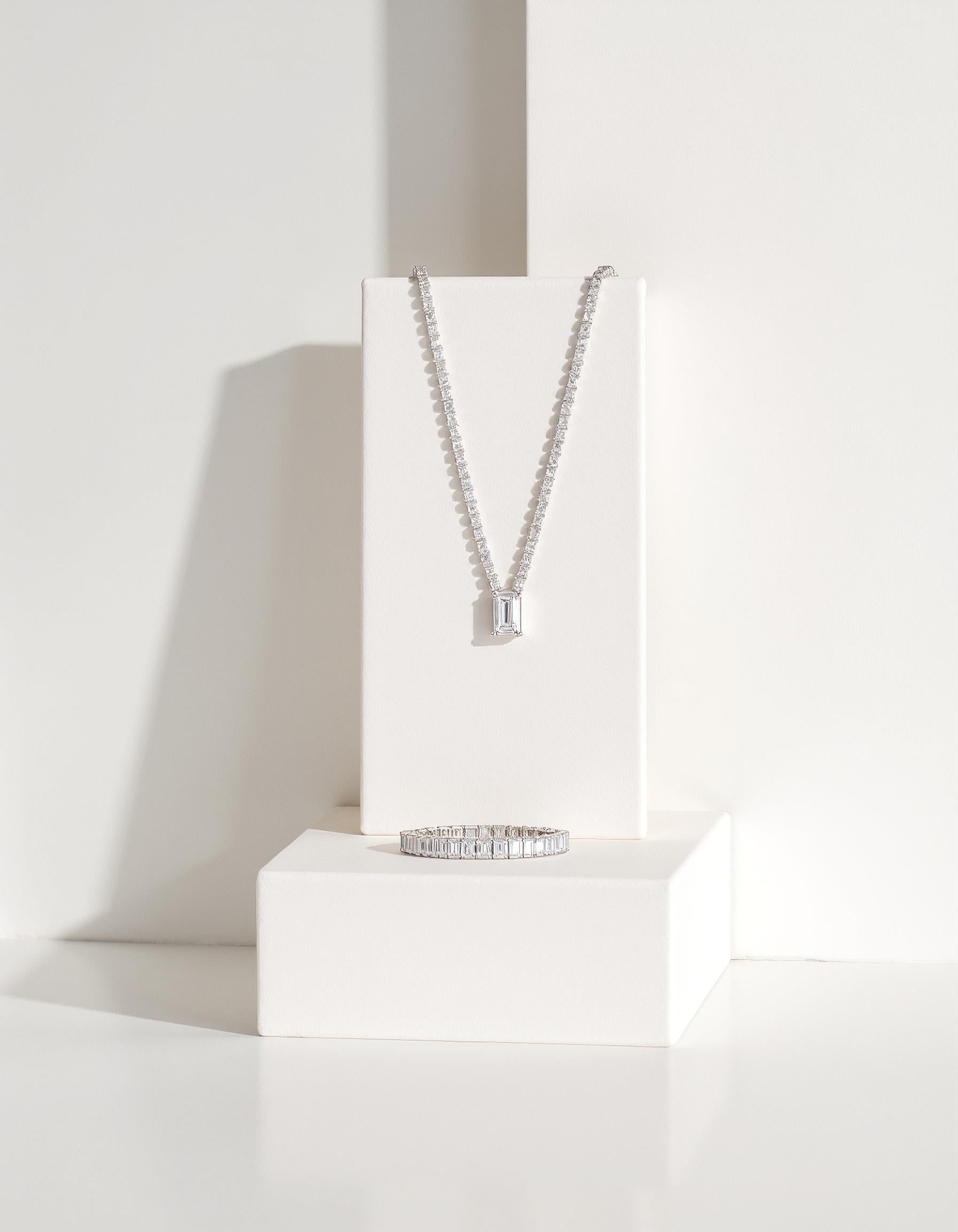 "Renja" Emerald Cut Classic Basket Prong set Tennis Bracelet