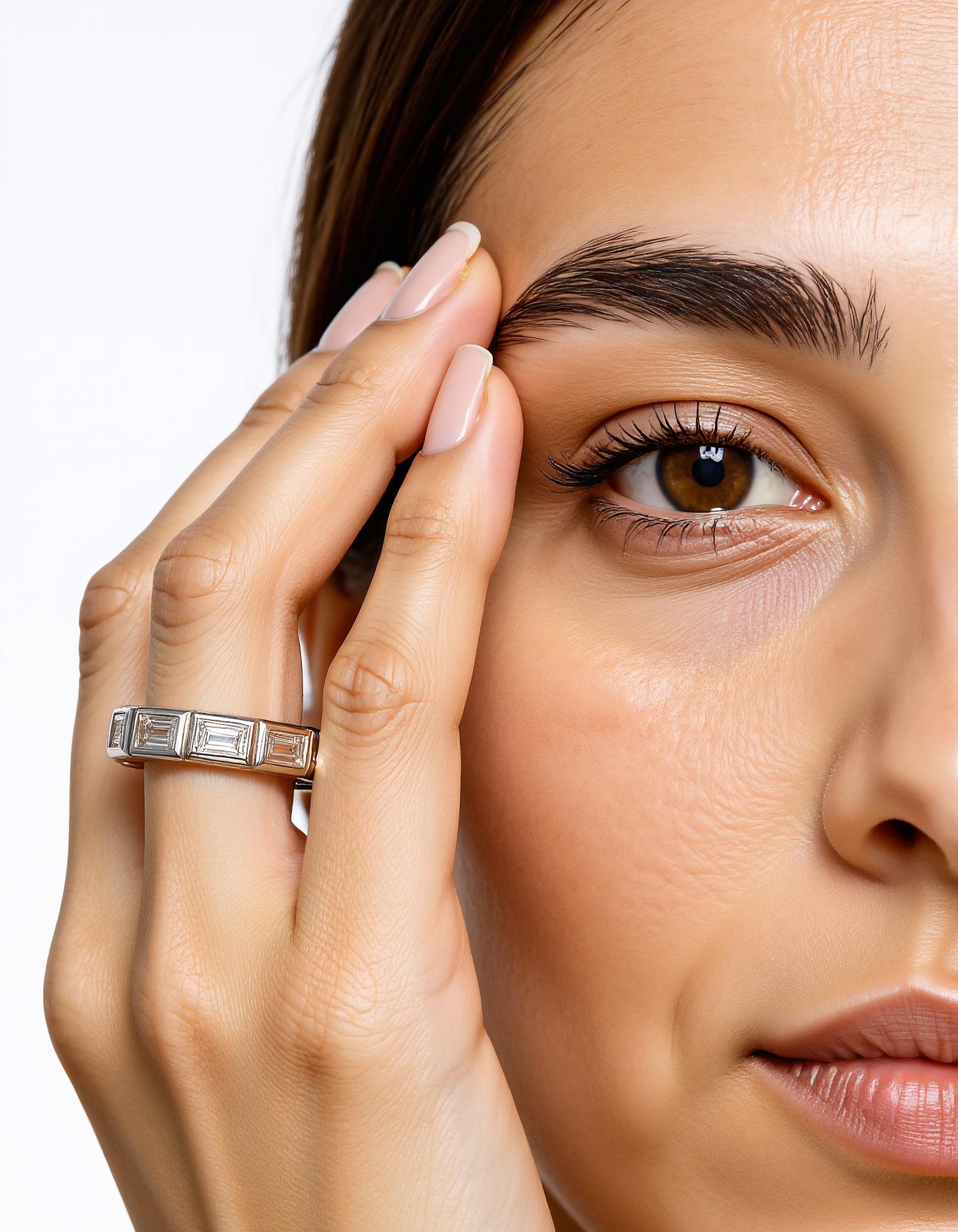 "Styrka" Horizontally set Baguette cut Bezel set Eternity Band