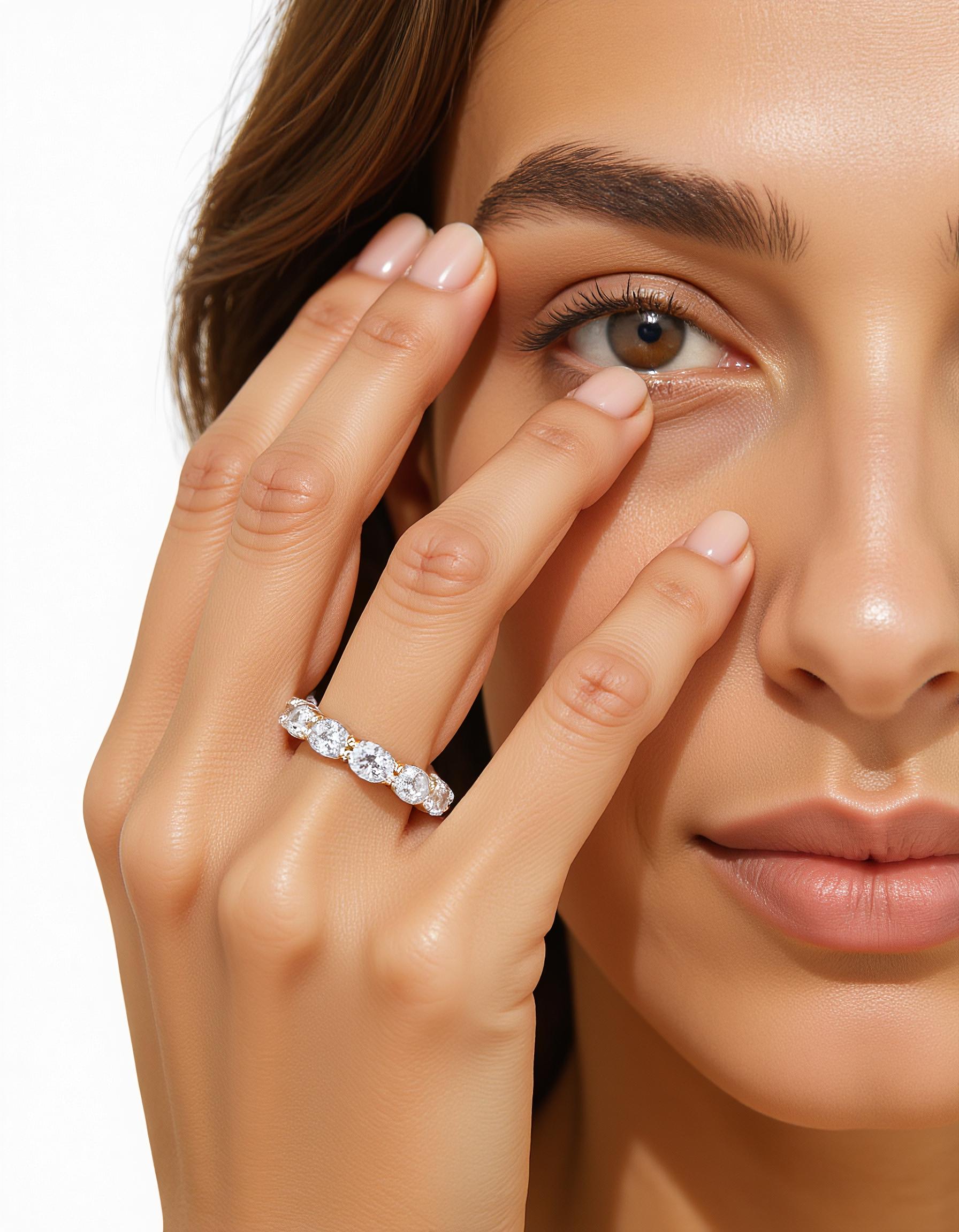 "Sia" Horizontally set Oval cut Prong set Eternity Band