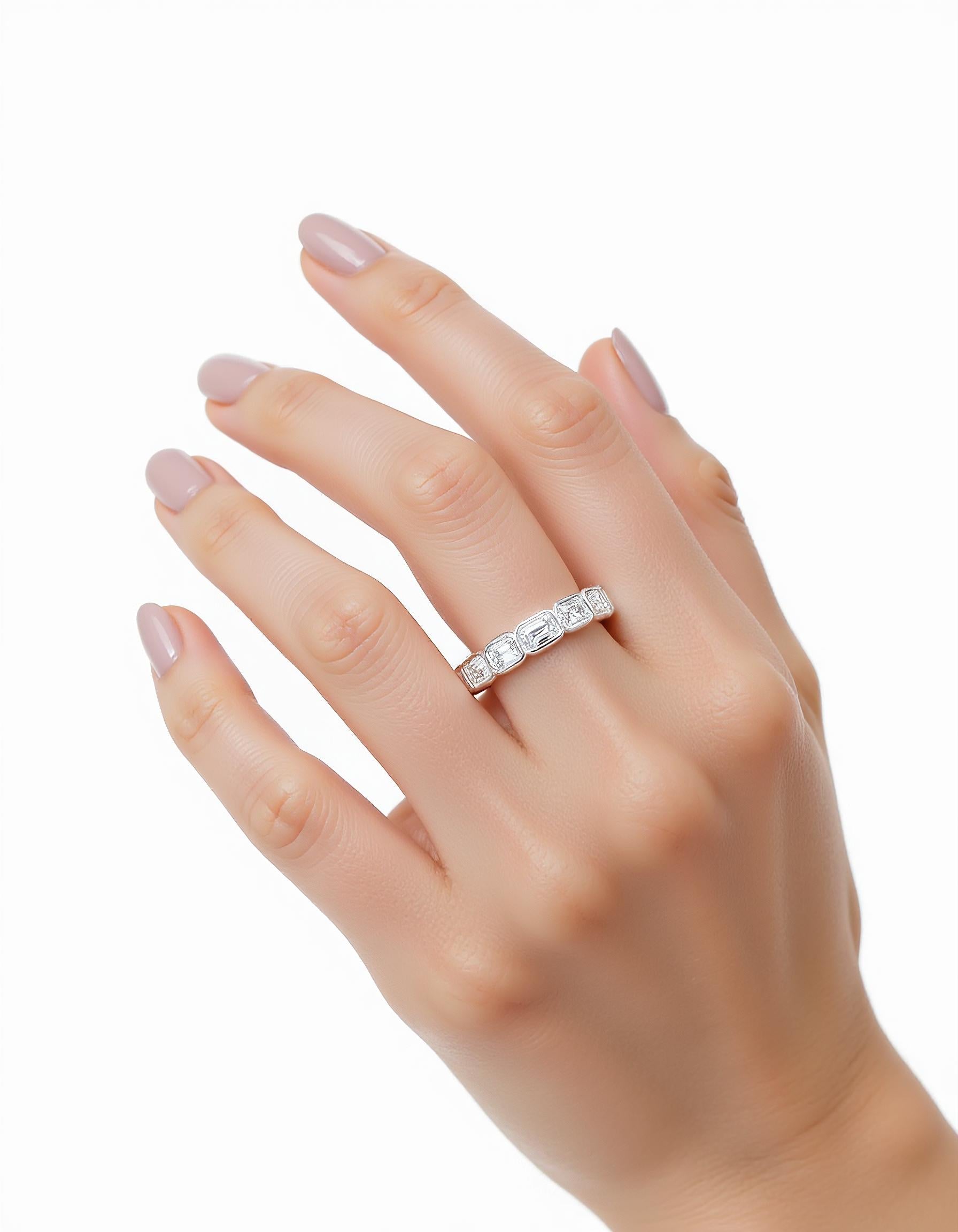 "Aria" Horizontally set Emerald cut Bezel set Eternity Band