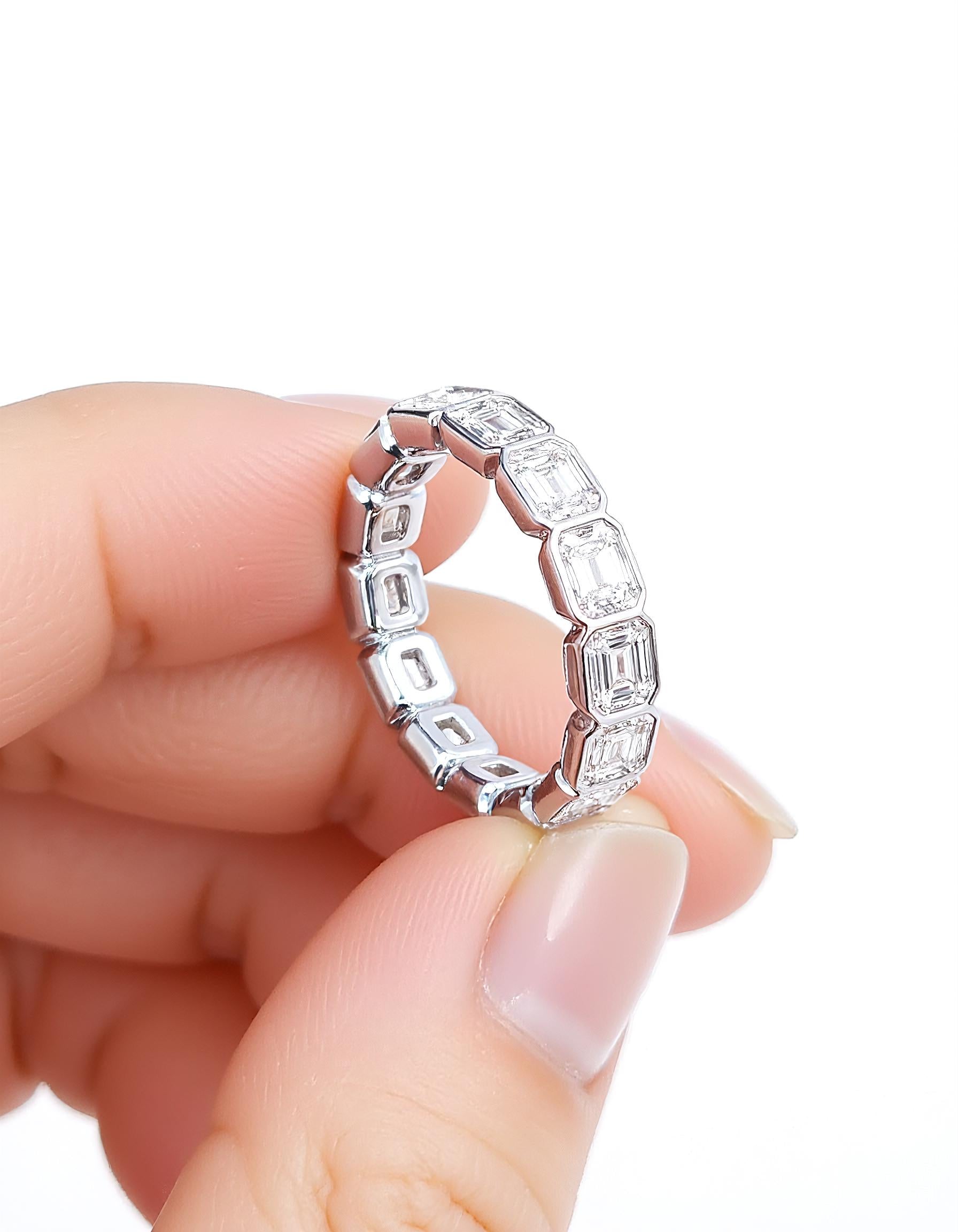 "Aria" Horizontally set Emerald cut Bezel set Eternity Band
