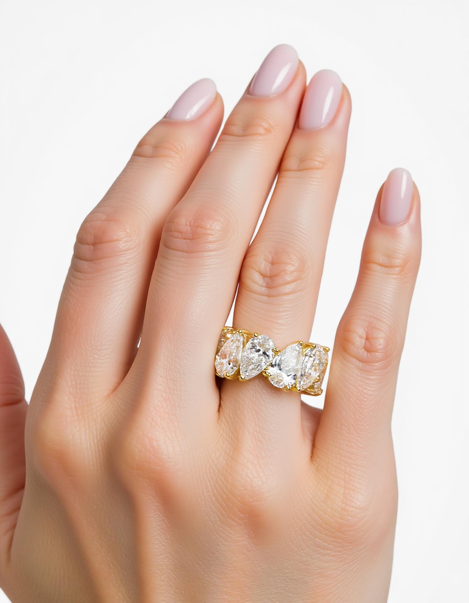 "Kris" Slanted set Pear Shape cut Prong set Eternity Band