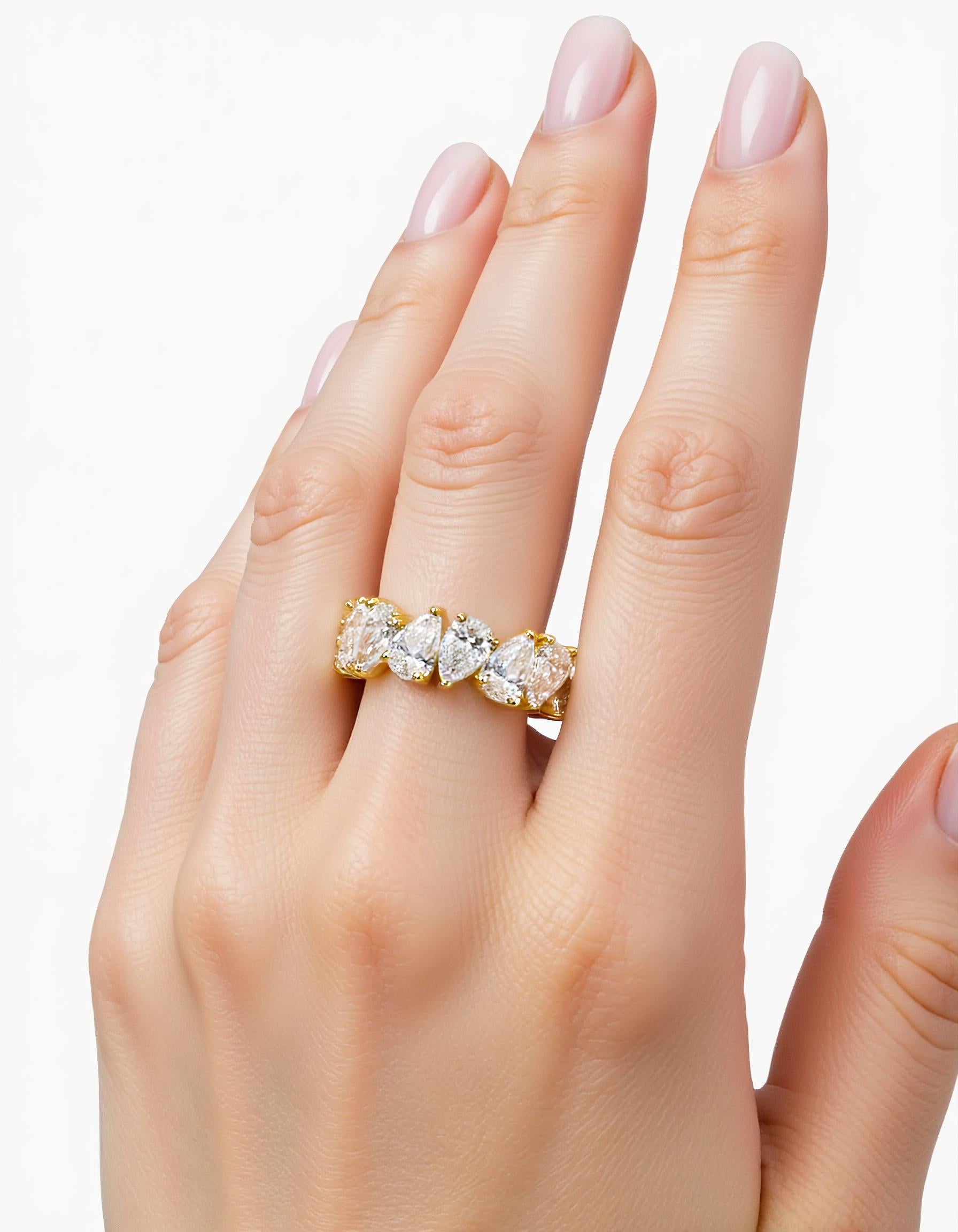 "Kris" Slanted set Pear Shape cut Prong set Eternity Band