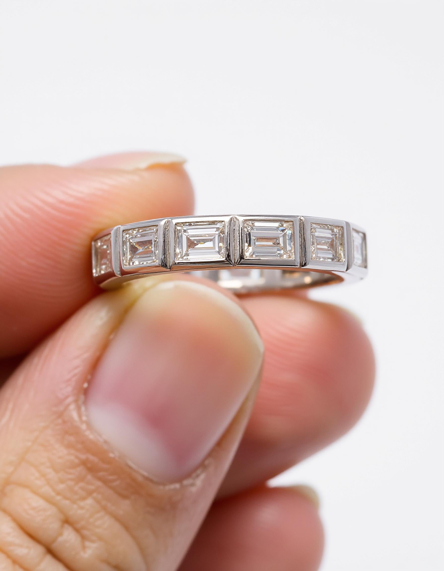"Styrka" Horizontally set Baguette cut Bezel set Eternity Band