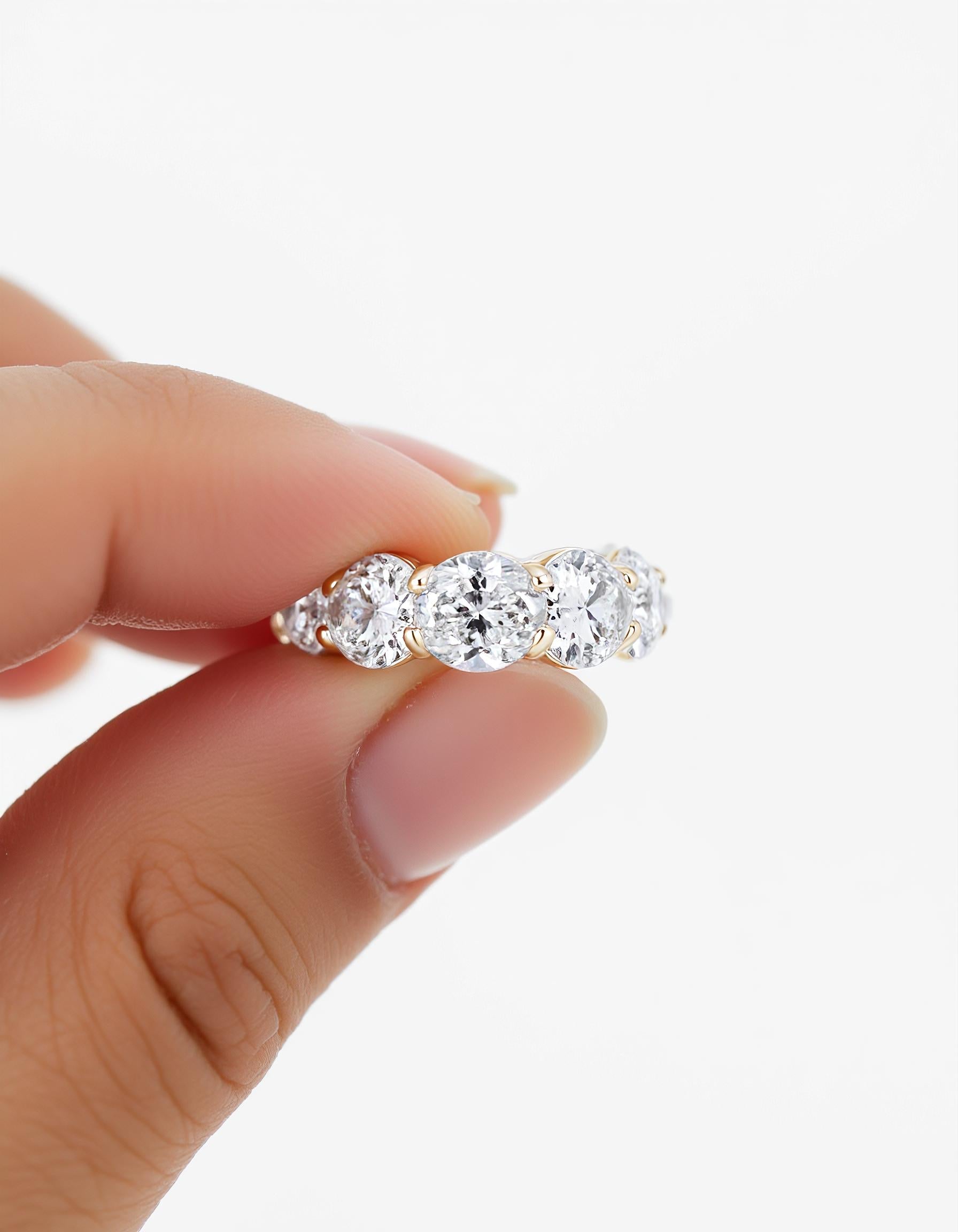 "Sia" Horizontally set Oval cut Prong set Eternity Band