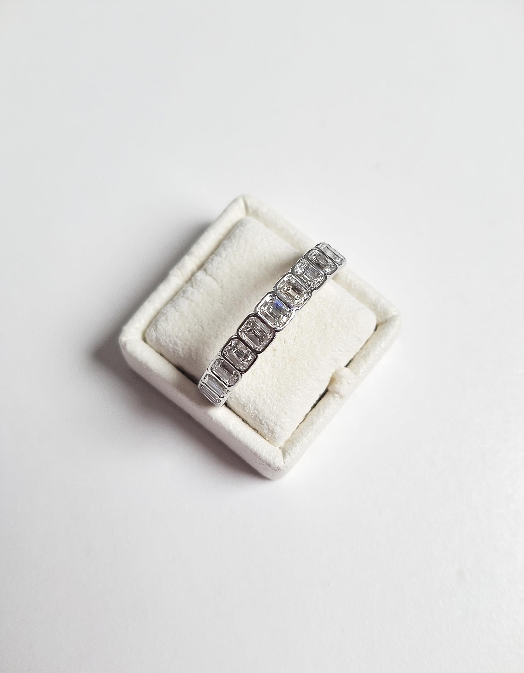 "Kaida" Emerald cut Bezel set Eternity Band