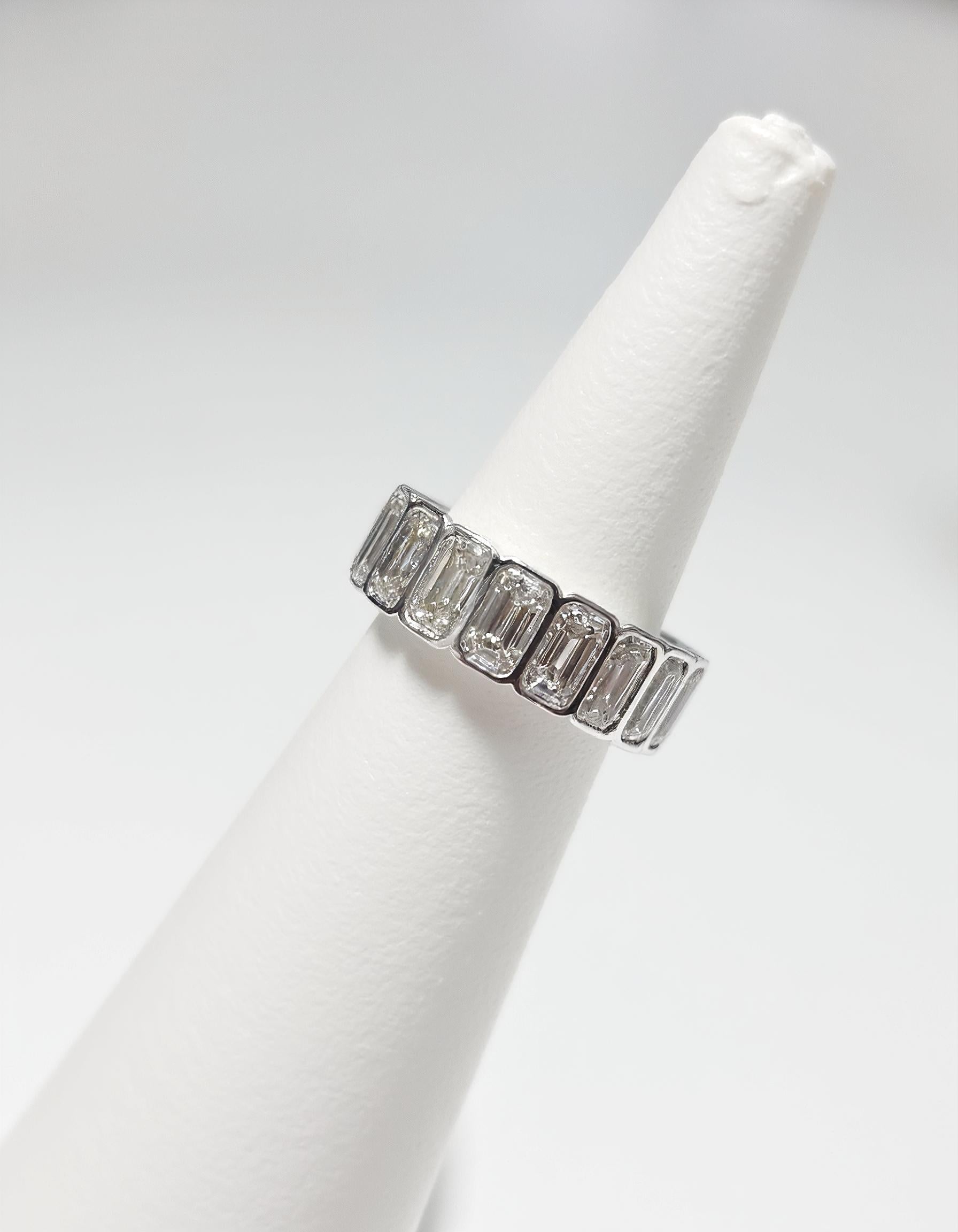 "Kaida" Emerald cut Bezel set Eternity Band