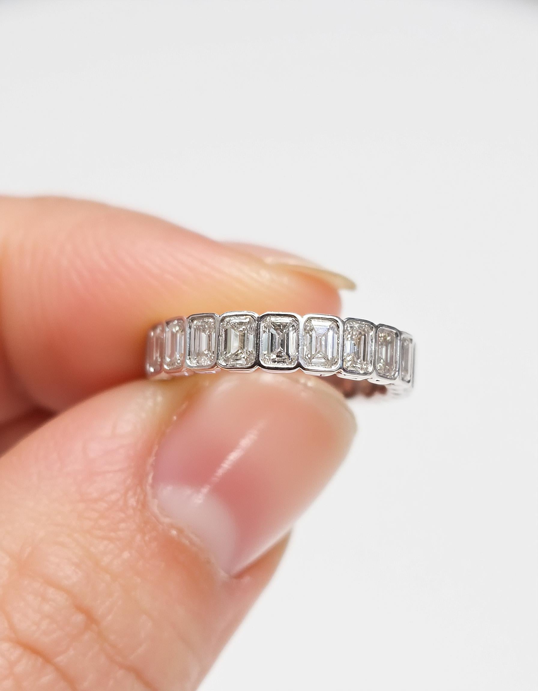 "Kaida" Emerald cut Bezel set Eternity Band