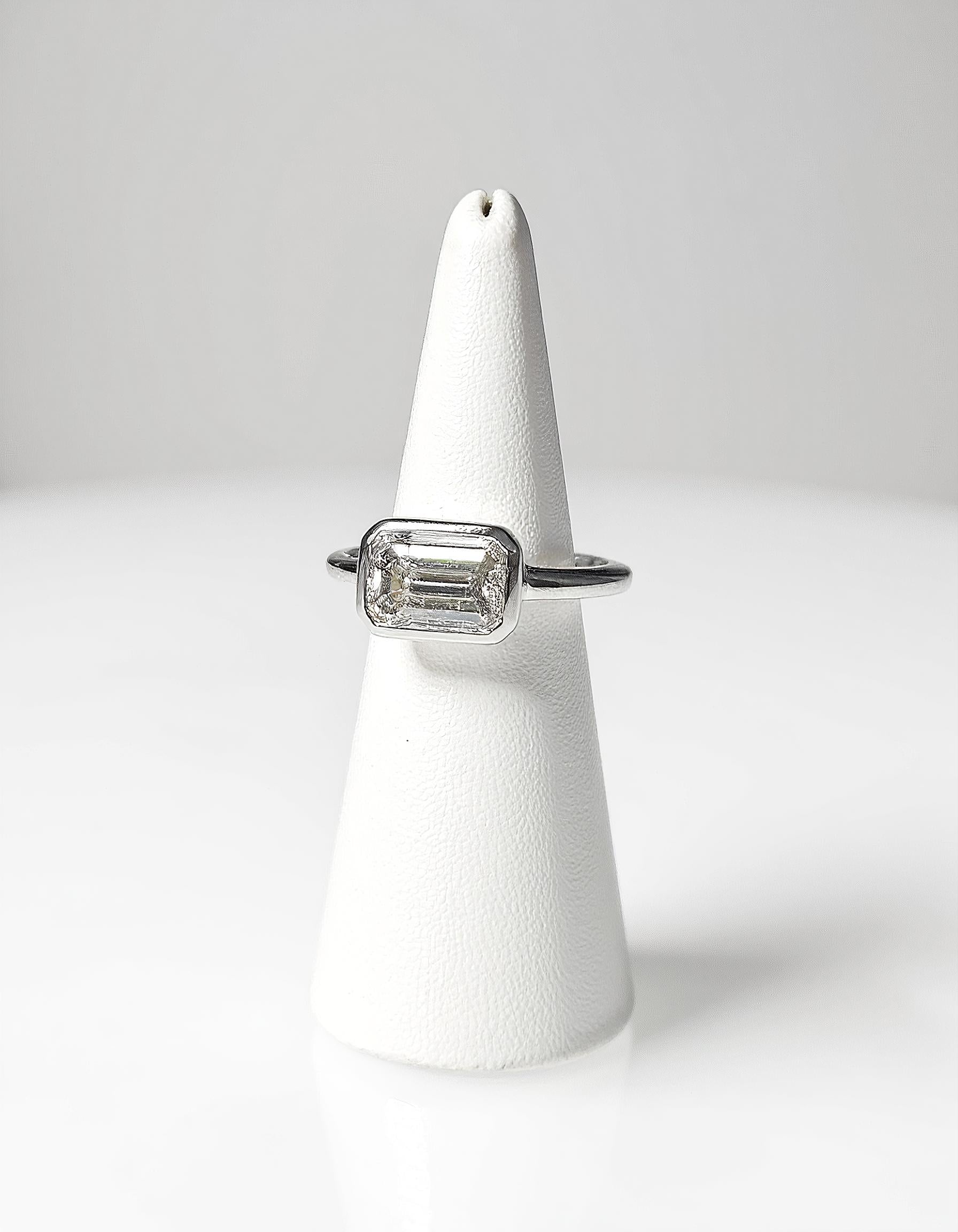 "Lana" Emerald Cut diamond solitaire in Bezel setting set Horizontally