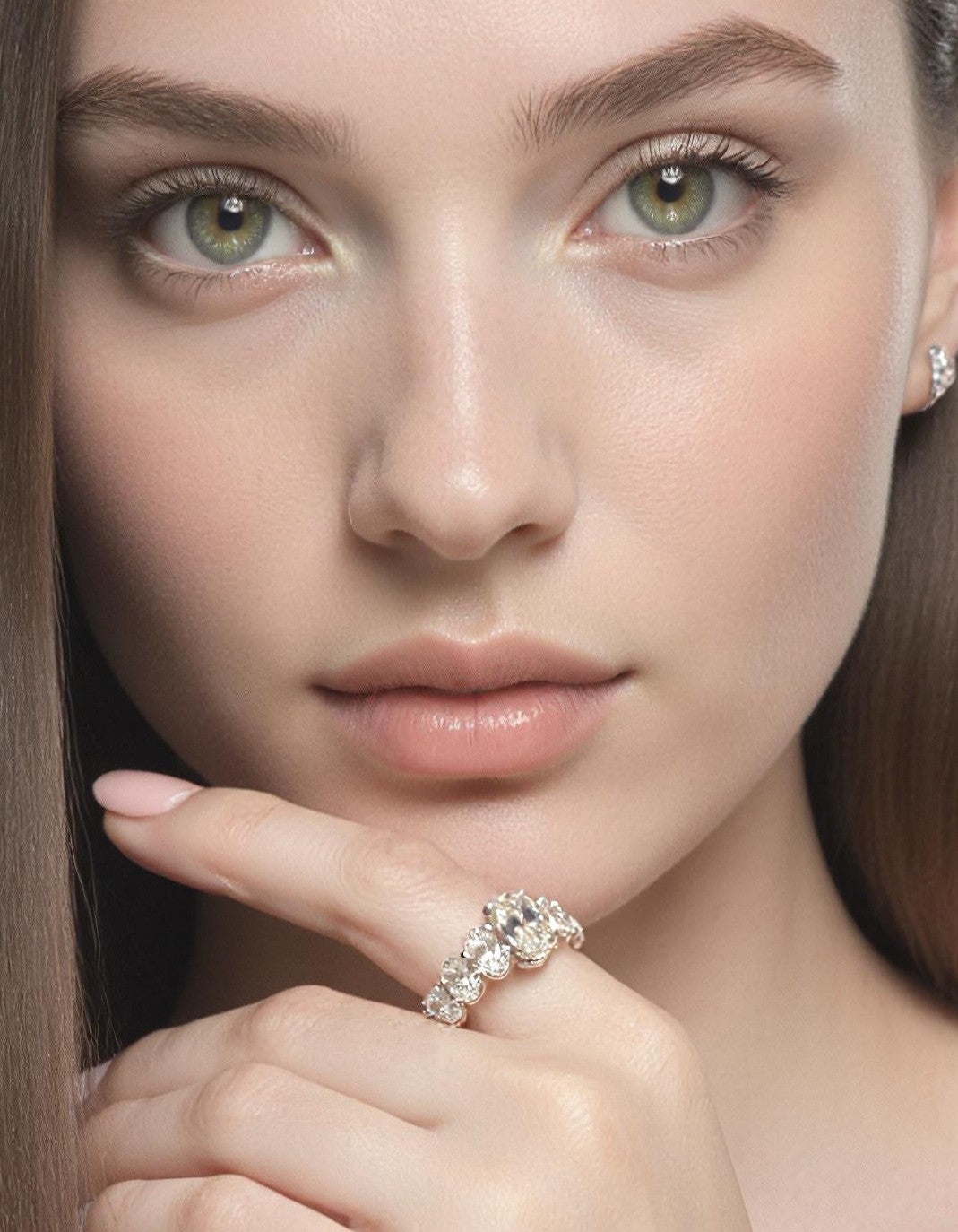 "Eyrlis" Oval Cut diamond 7 stone ring Graduated Prong setting