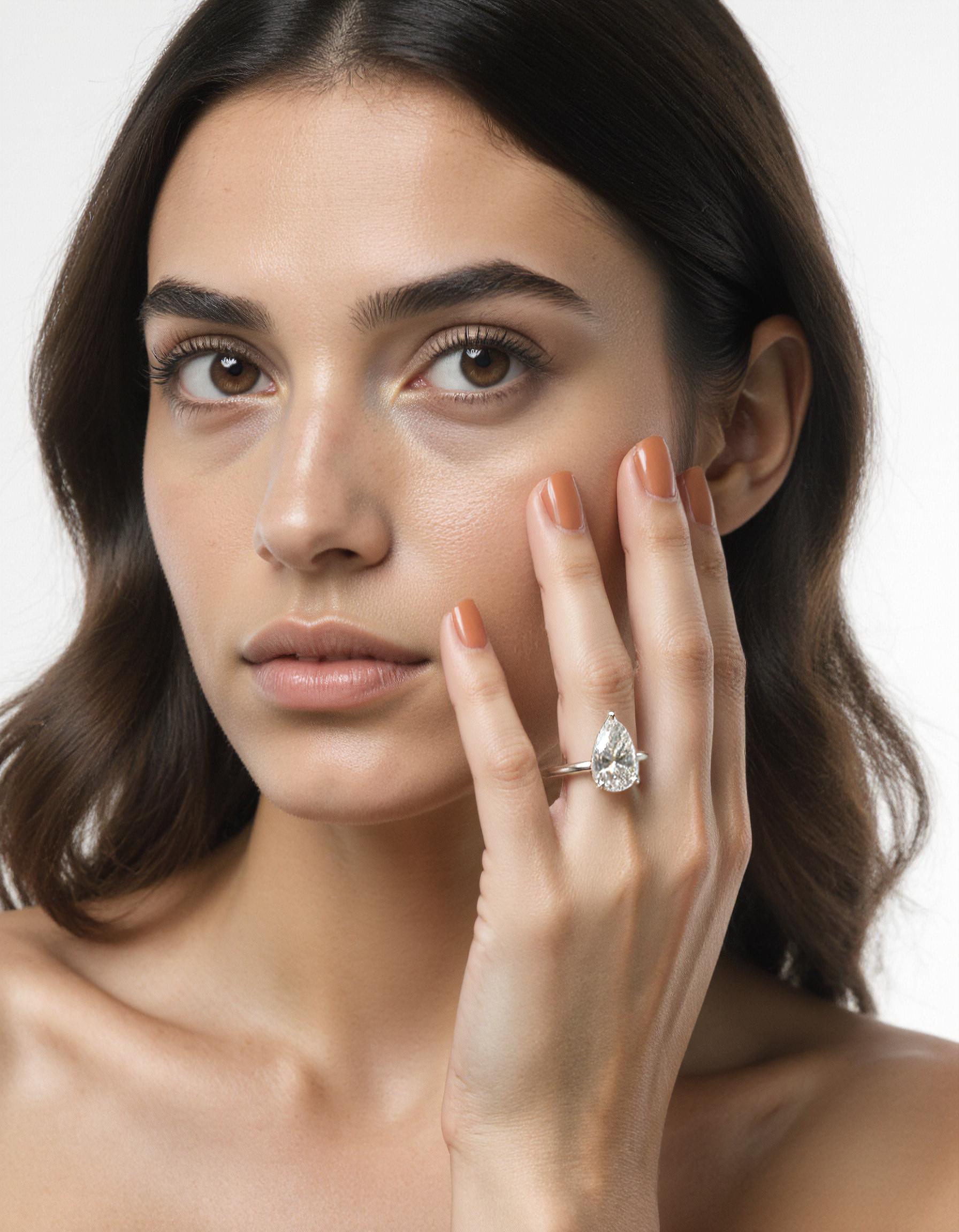 "Kiki" Pear Shape Cut diamond solitaire in Prong setting