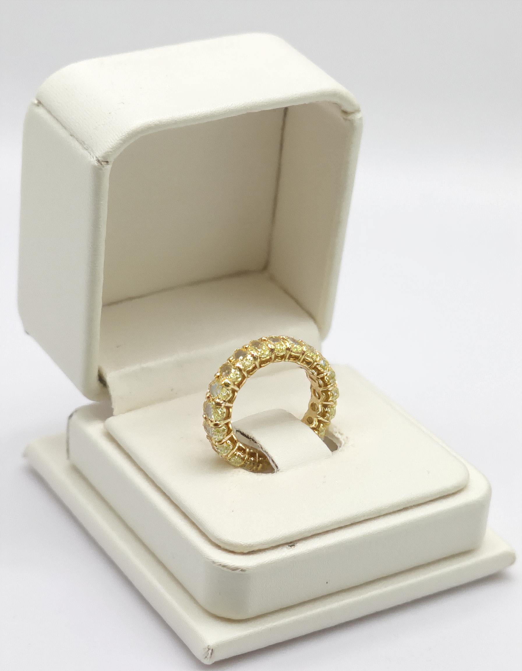 "Seriva" Fancy Yellow Oval cut Prong set Eternity Band