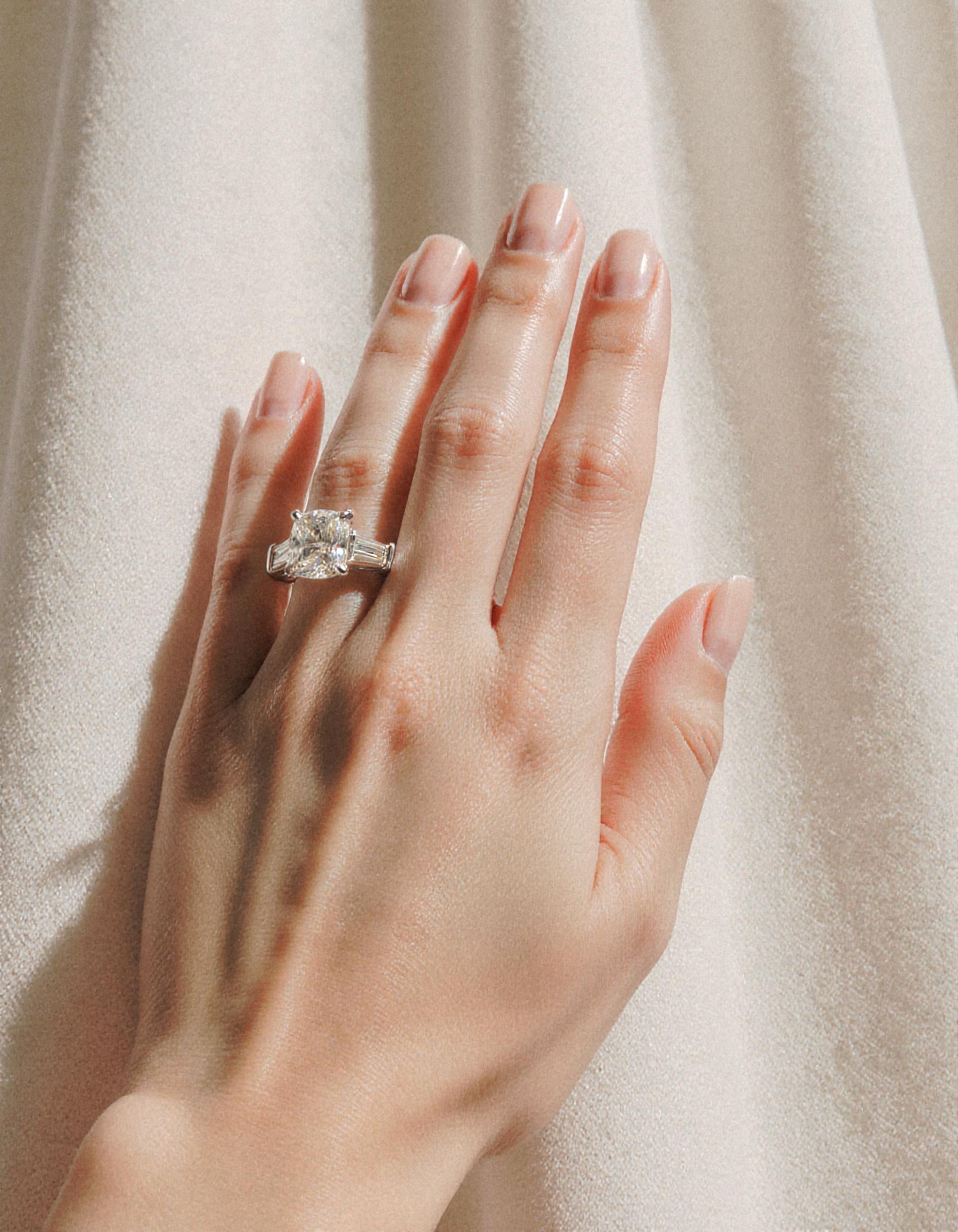 "Milara" 3 stone Diamond ring With Cushion cut center and Tapered Baguette side stones