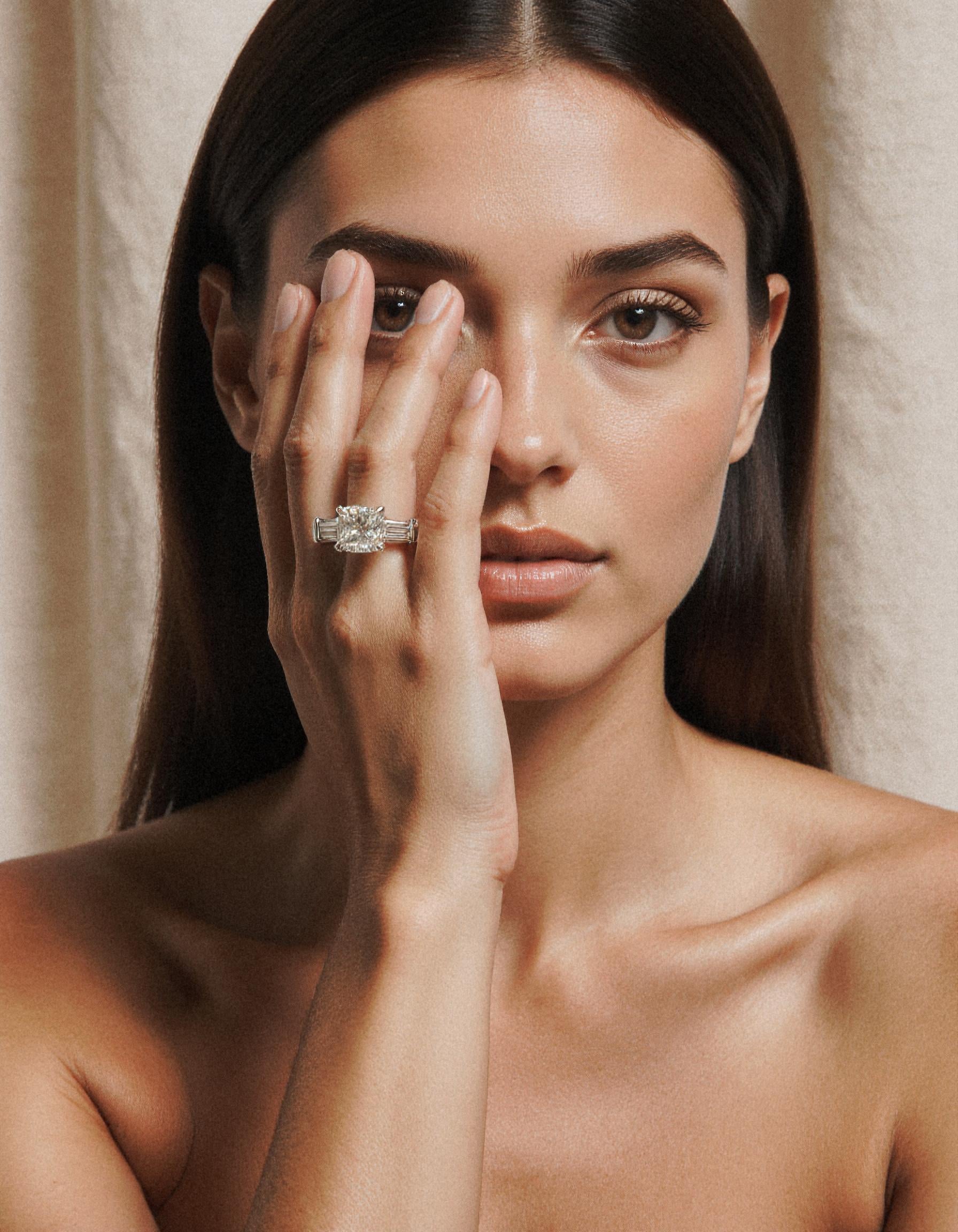 "Milara" 3 stone Diamond ring With Cushion cut center and Tapered Baguette side stones