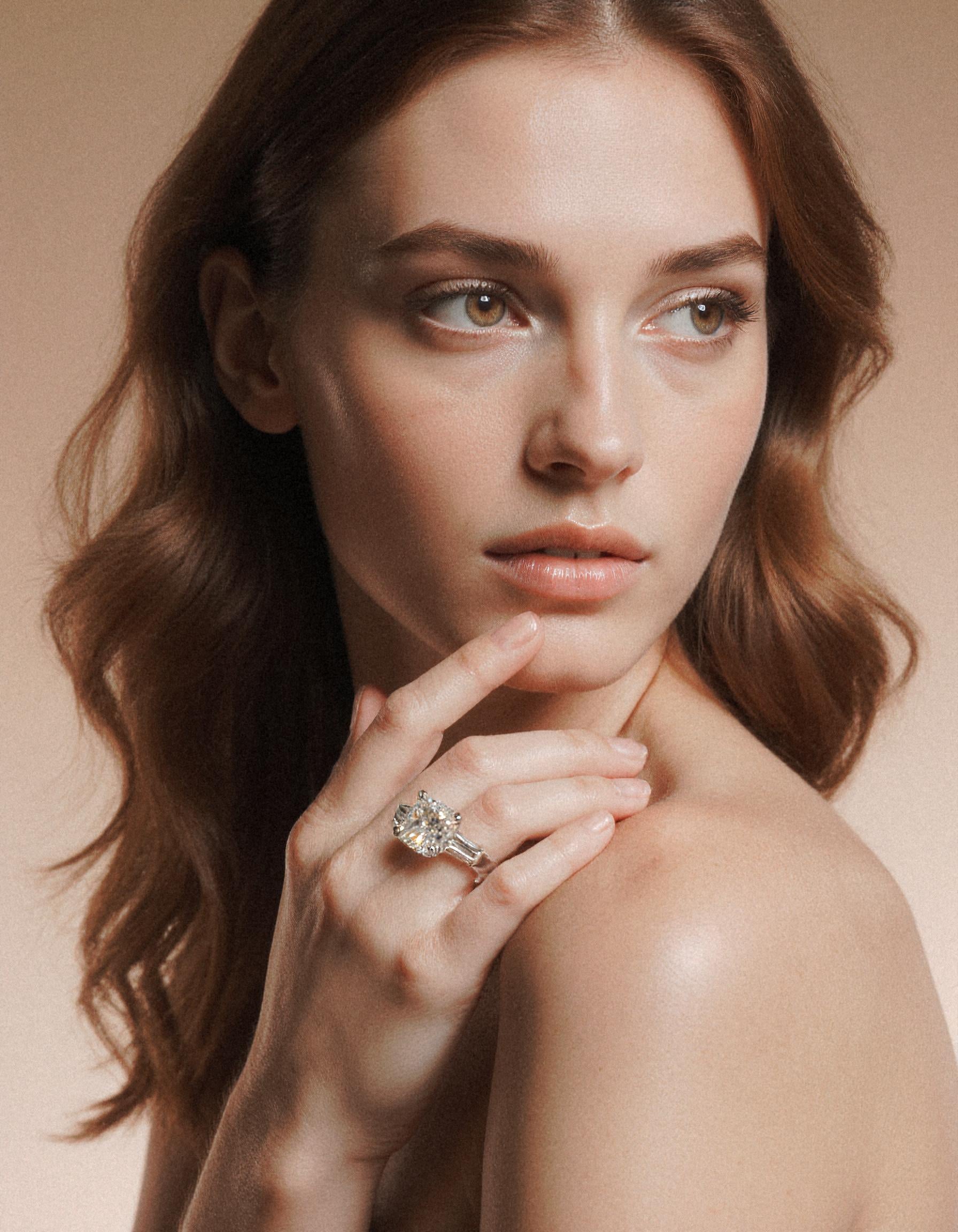 "Milara" 3 stone Diamond ring With Cushion cut center and Tapered Baguette side stones