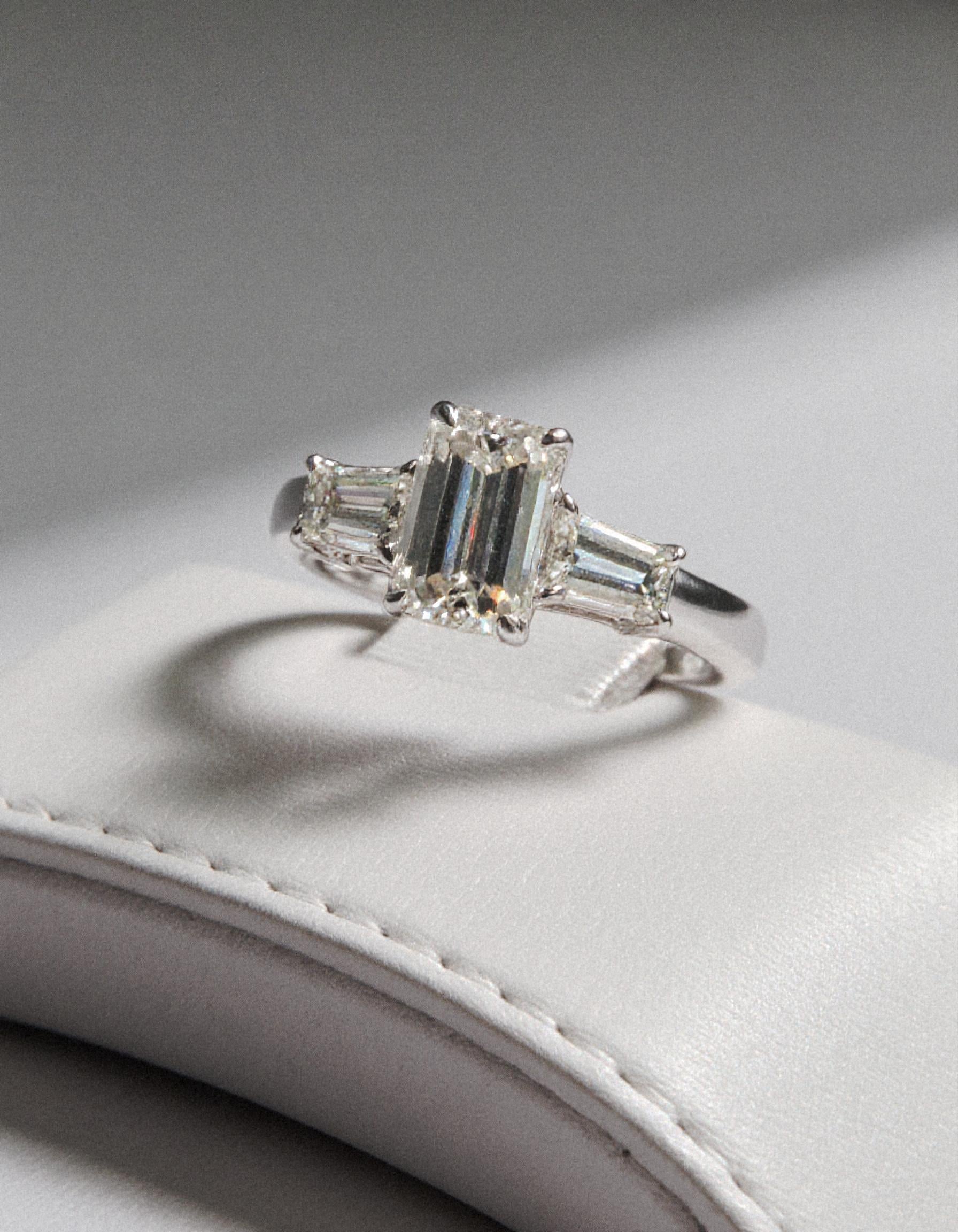 "Allegra" 3 stone Diamond ring With Emerald cut center and Tapered Baguette side stones