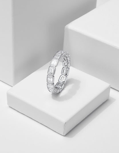 &quot;Aria&quot; Horizontally set Emerald cut Bezel set Eternity Band