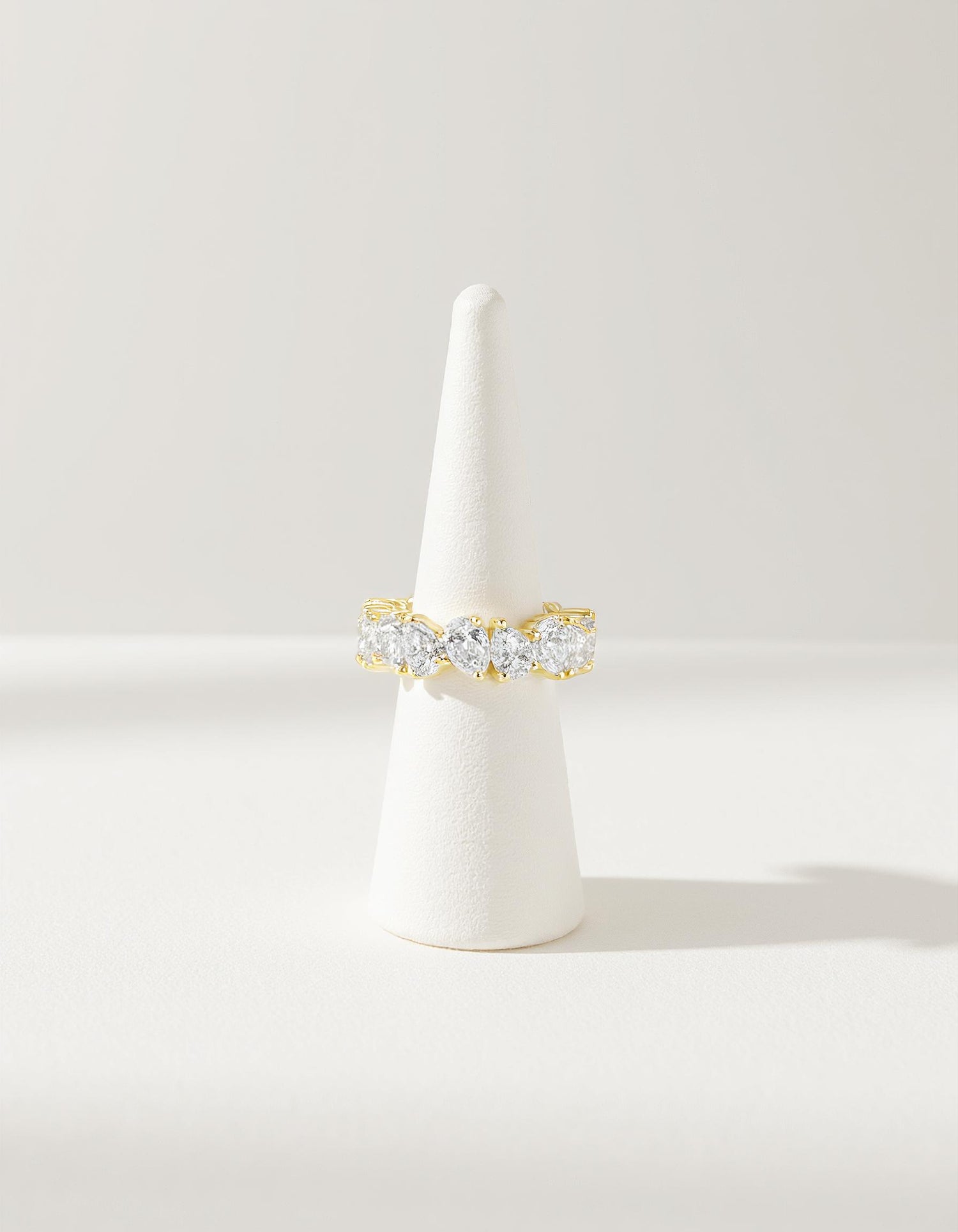 &quot;Kris&quot; Slanted set Pear Shape cut Prong set Eternity Band