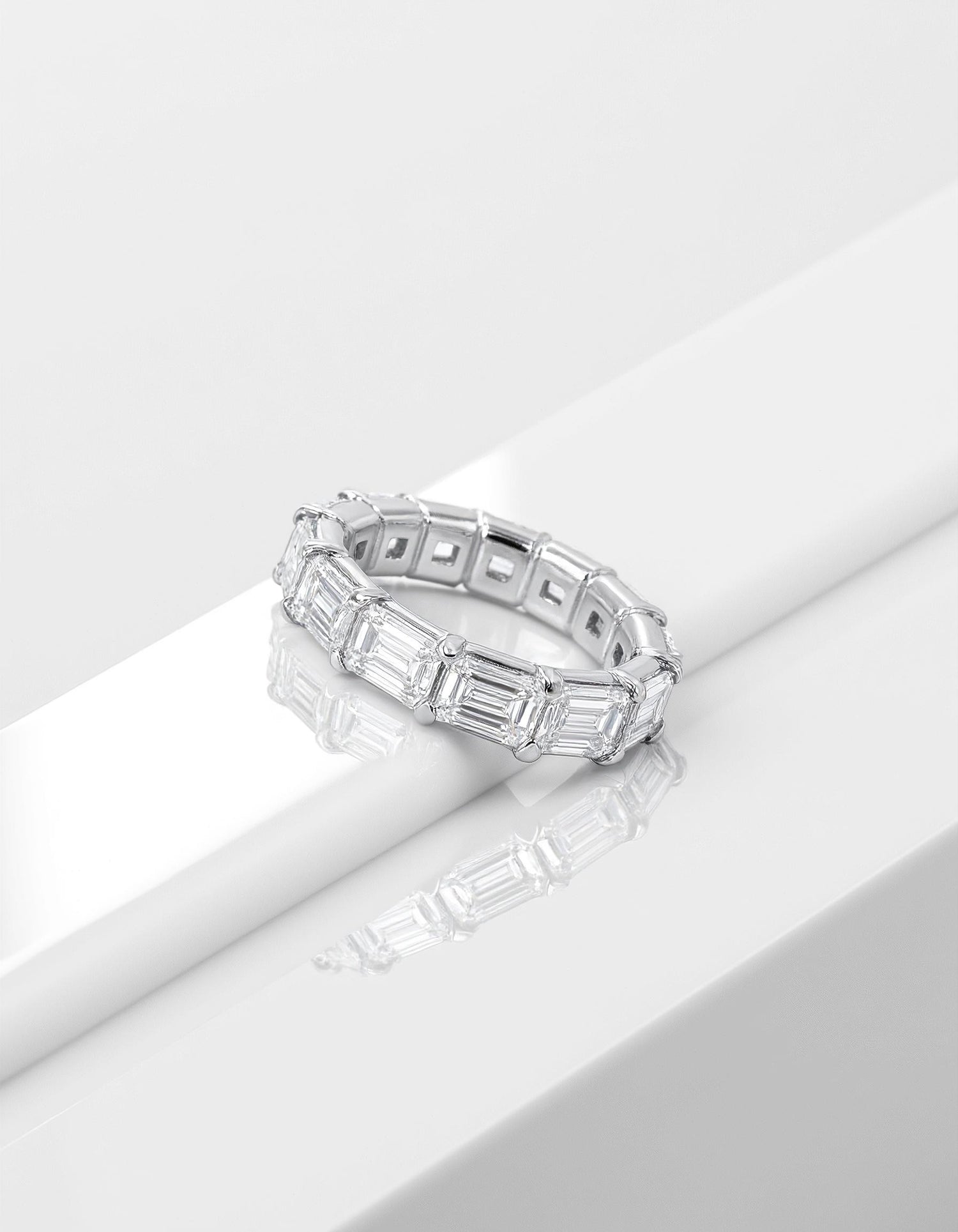 &quot;Nova&quot; Horizontally Set Emerald cut Prong set Eternity Band (0.50ct Each)