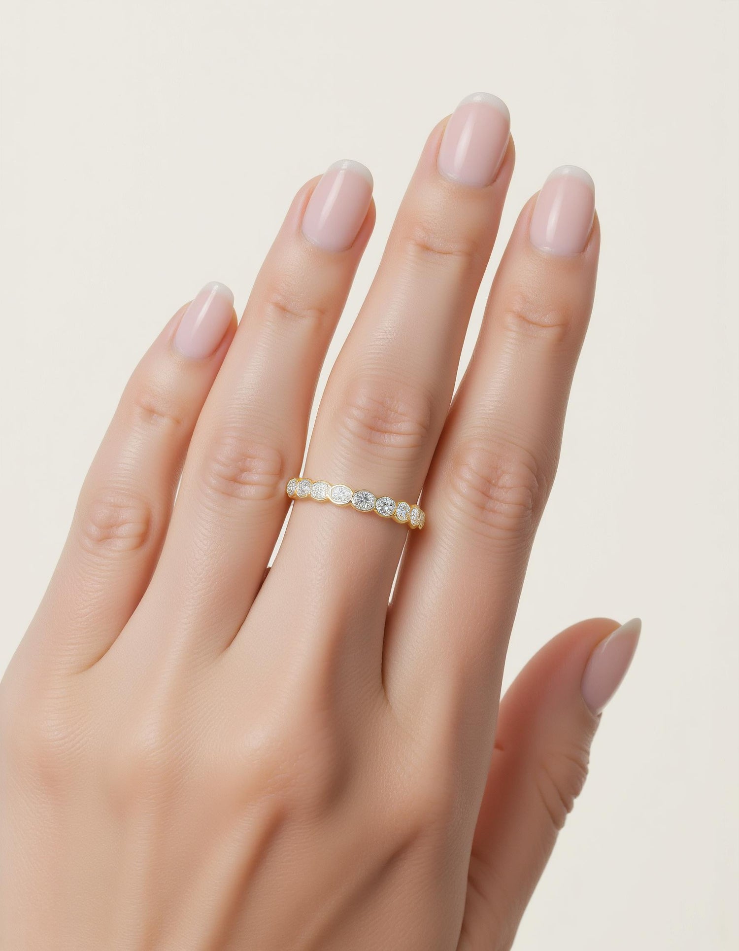 &quot;Odessa&quot; Horizontally Set Oval cut Bezel set Eternity Band