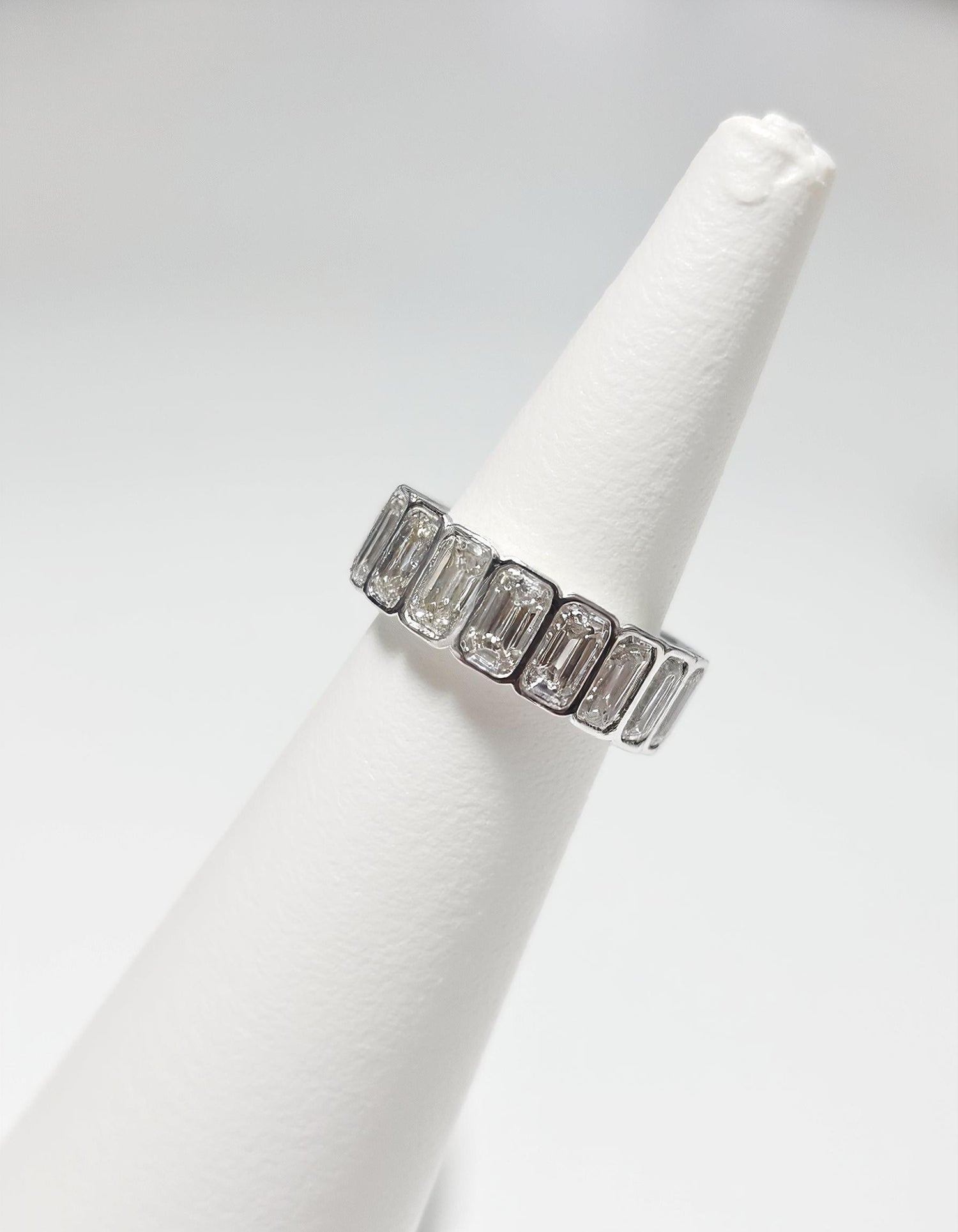 &quot;Kaida&quot; Emerald cut Bezel set Eternity Band
