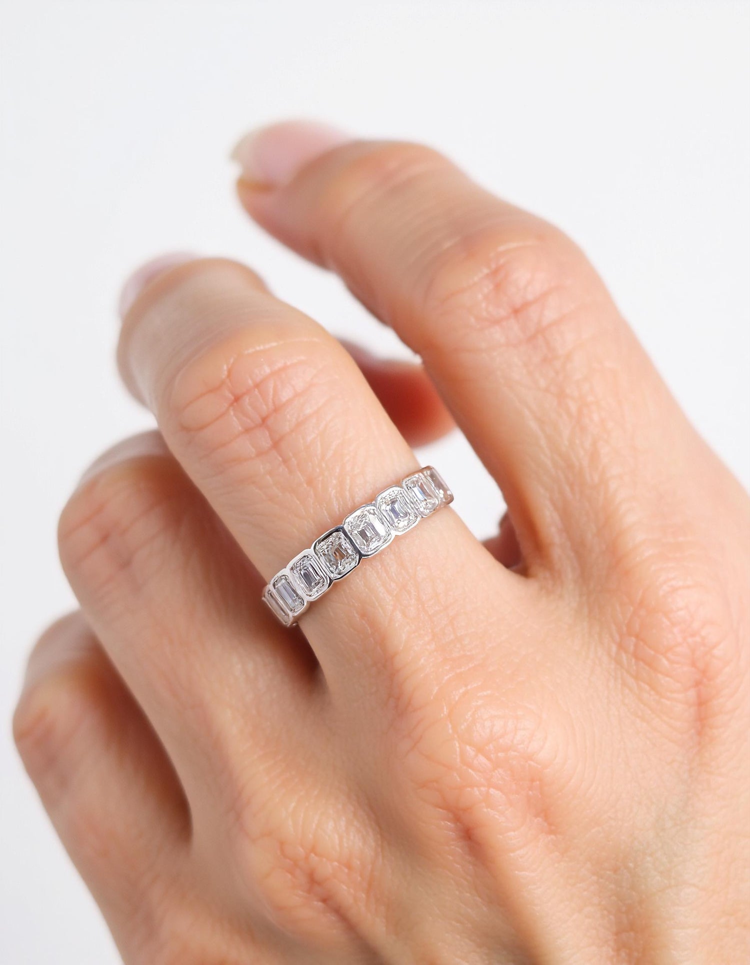 &quot;Kaida&quot; Emerald cut Bezel set Eternity Band