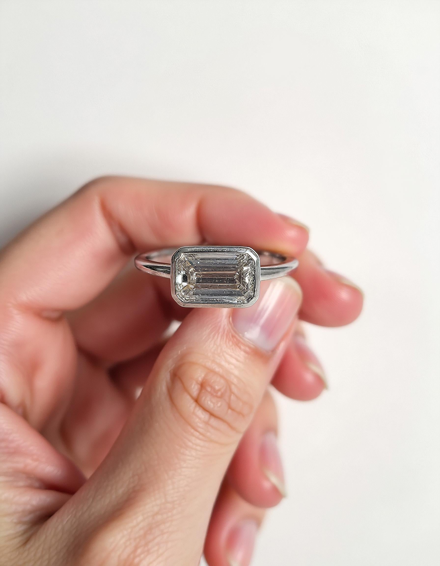 &quot;Lana&quot; Emerald Cut diamond solitaire in Bezel setting set Horizontally