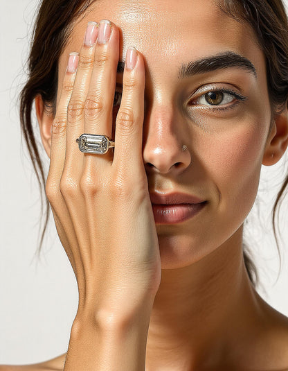 &quot;Lana&quot; Emerald Cut diamond solitaire in Bezel setting set Horizontally