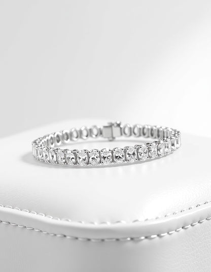 &quot;Fyndi&quot; Classic basket Oval Cut Prong set Tennis Bracelet