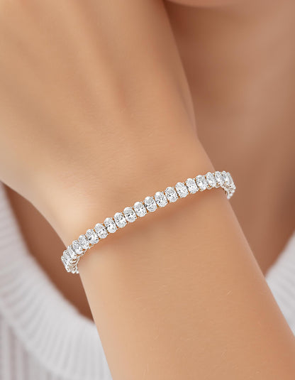 &quot;Fyndi&quot; Classic basket Oval Cut Prong set Tennis Bracelet