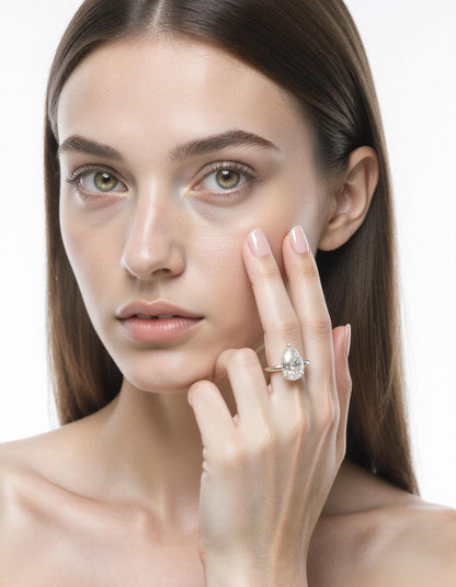 &quot;Kiki&quot; Pear Shape Cut diamond solitaire in Prong setting