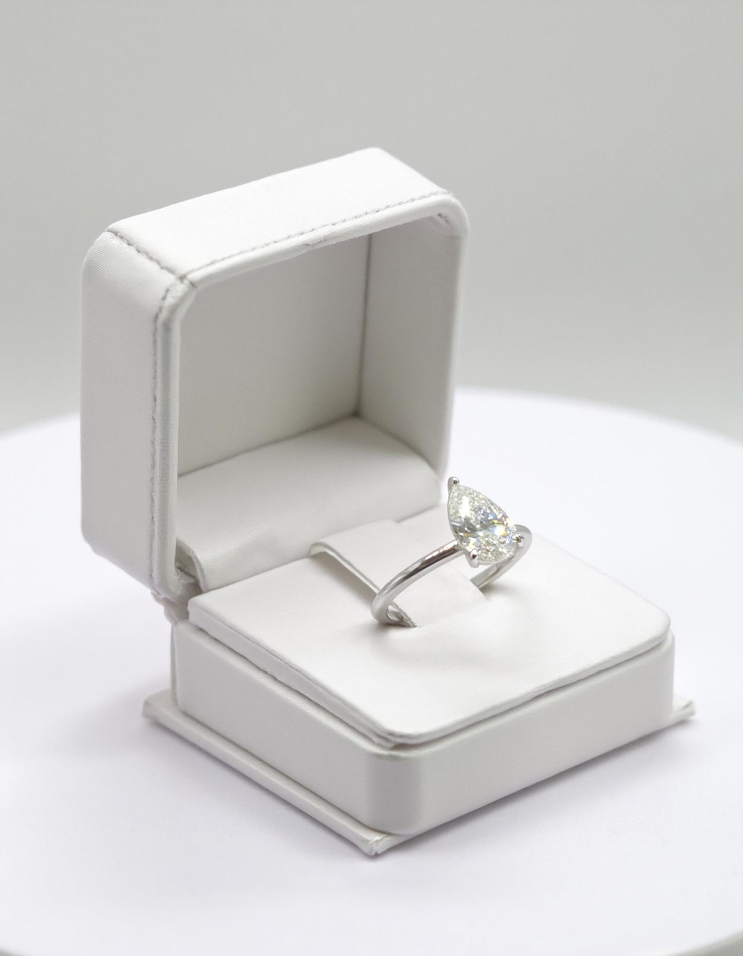 &quot;Kiki&quot; Pear Shape Cut diamond solitaire in Prong setting