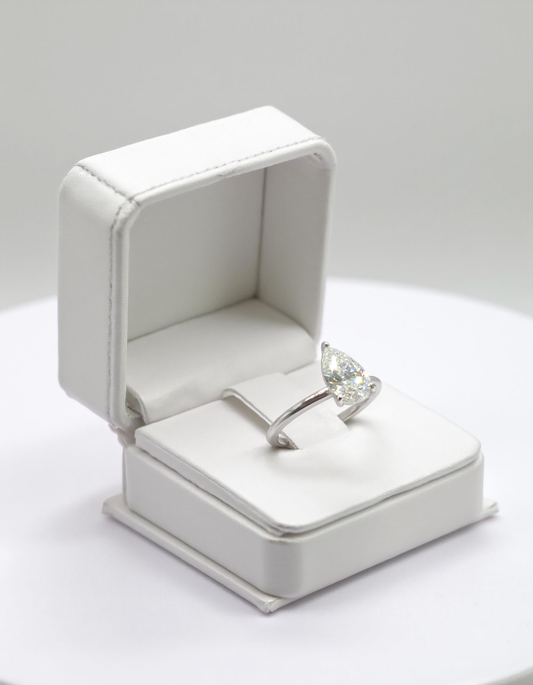 &quot;Kiki&quot; Pear Shape Cut diamond solitaire in Prong setting