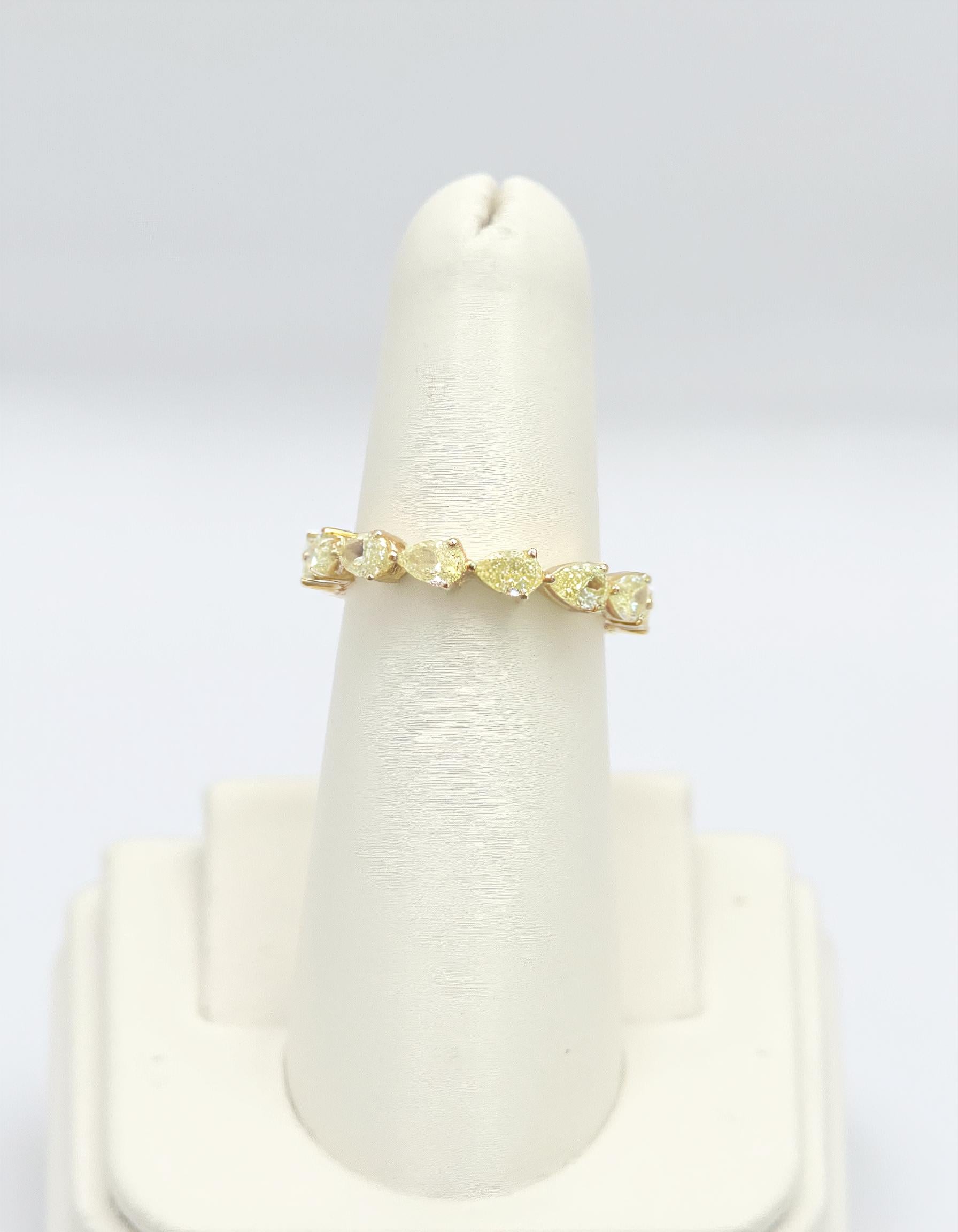 &quot;Torina&quot; Fancy Yellow Pear Shape Horizontal Prong set Eternity Band