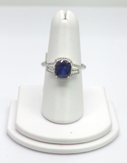 &quot;Lirine&quot; Cushion cut Blue Sapphire with tapered baguette Diamonds with an Halo Ring