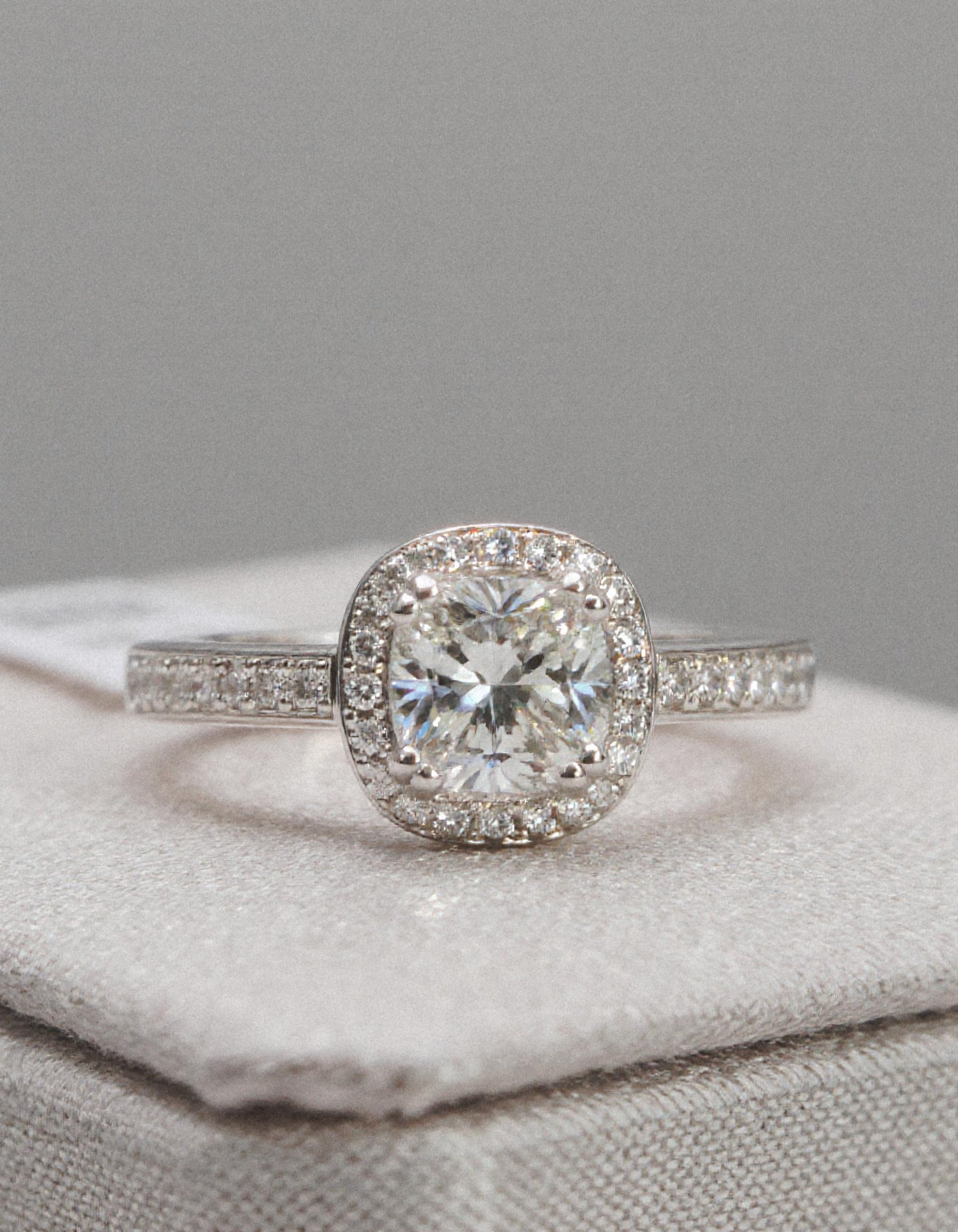 &quot;Nareta&quot; Cushion cut Center stone with Round Brilliant Halo Engagement Ring