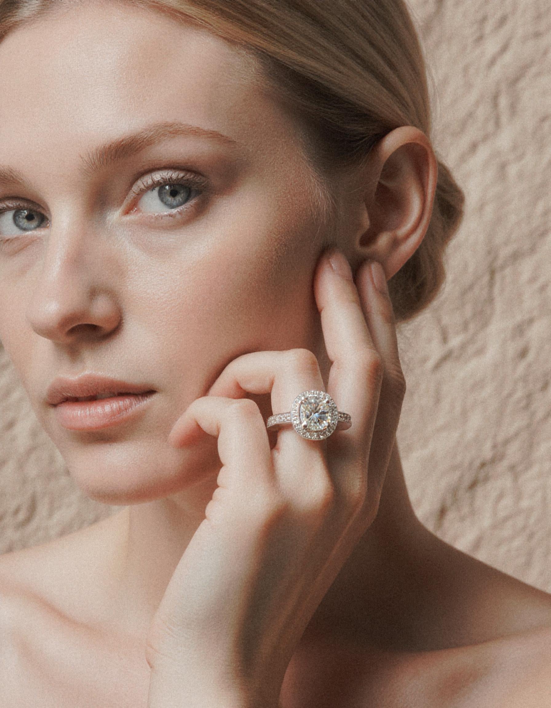 &quot;Nareta&quot; Cushion cut Center stone with Round Brilliant Halo Engagement Ring