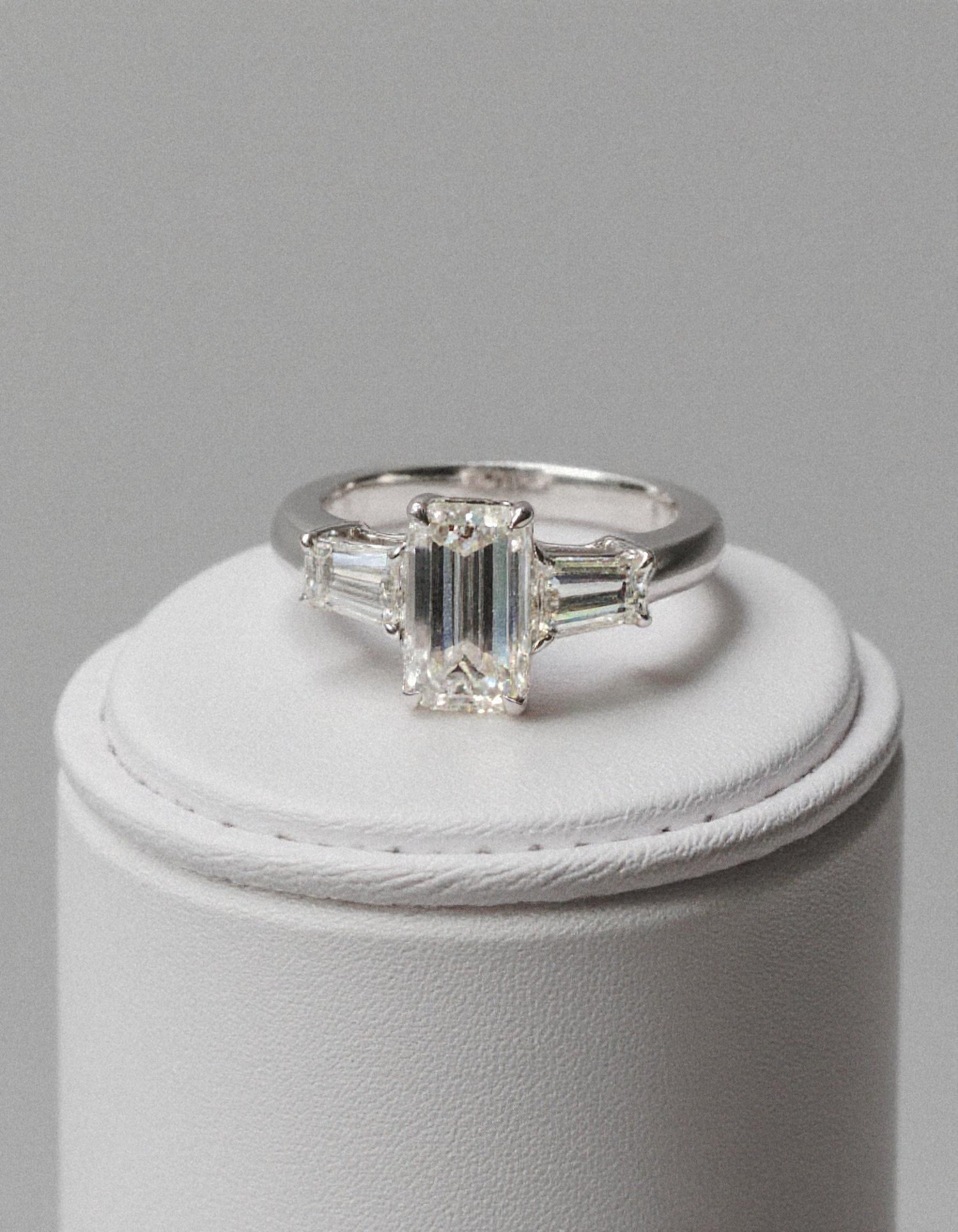 &quot;Allegra&quot; 3 stone Diamond ring With Emerald cut center and Tapered Baguette side stones