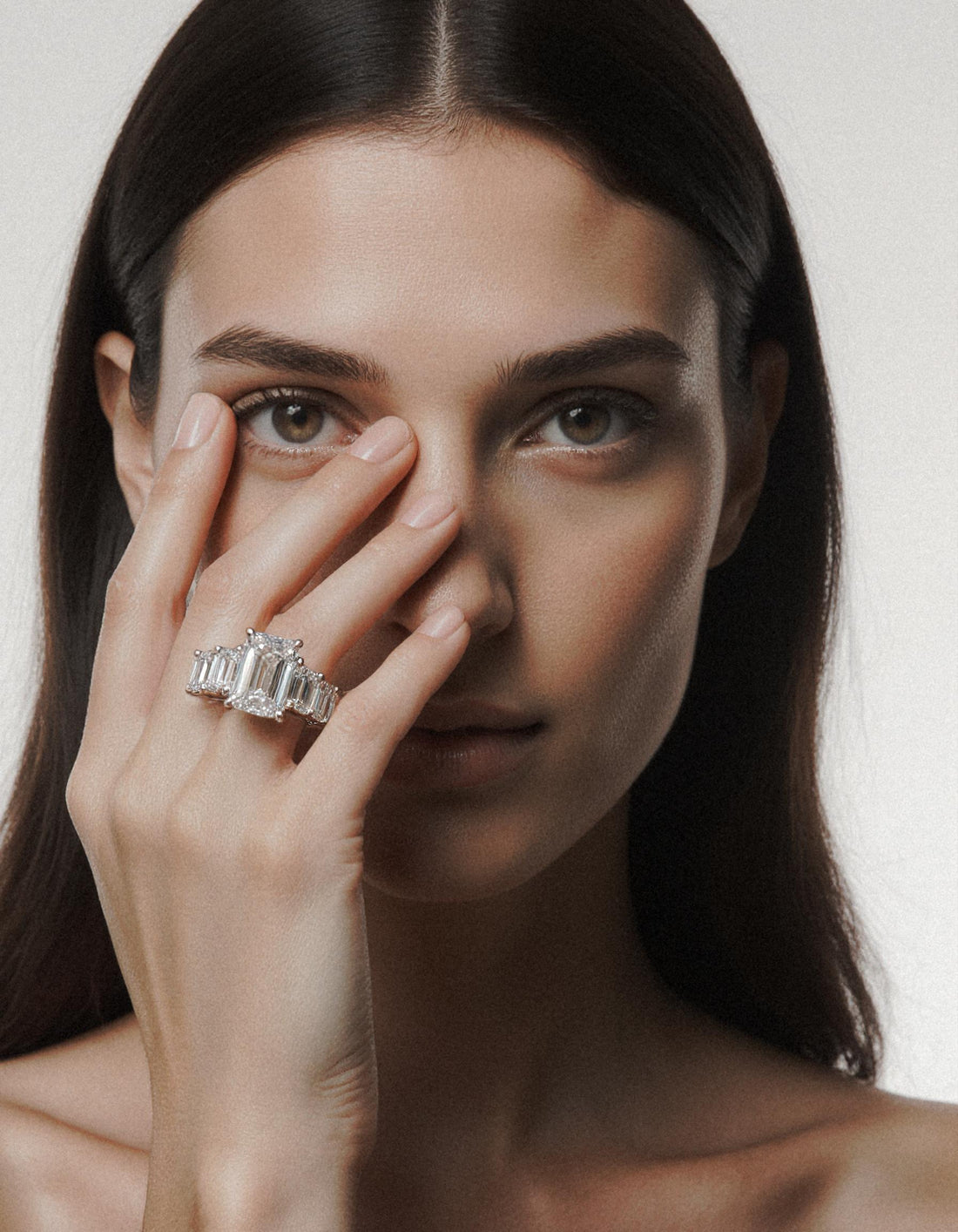 &quot;Rozalin&quot; 7 Stone Emerald cut Graduated Prong Set Engagement Ring