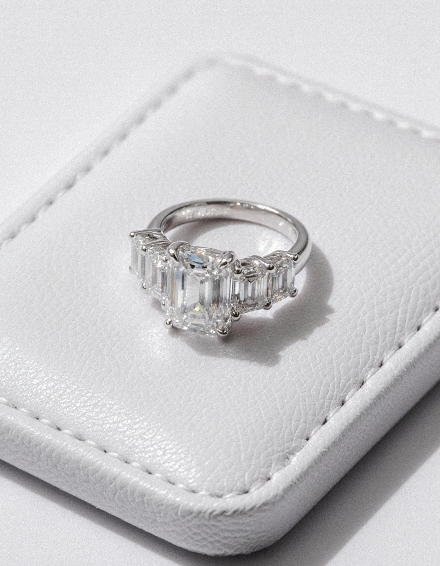 &quot;Rozalin&quot; 7 Stone Emerald cut Graduated Prong Set Engagement Ring