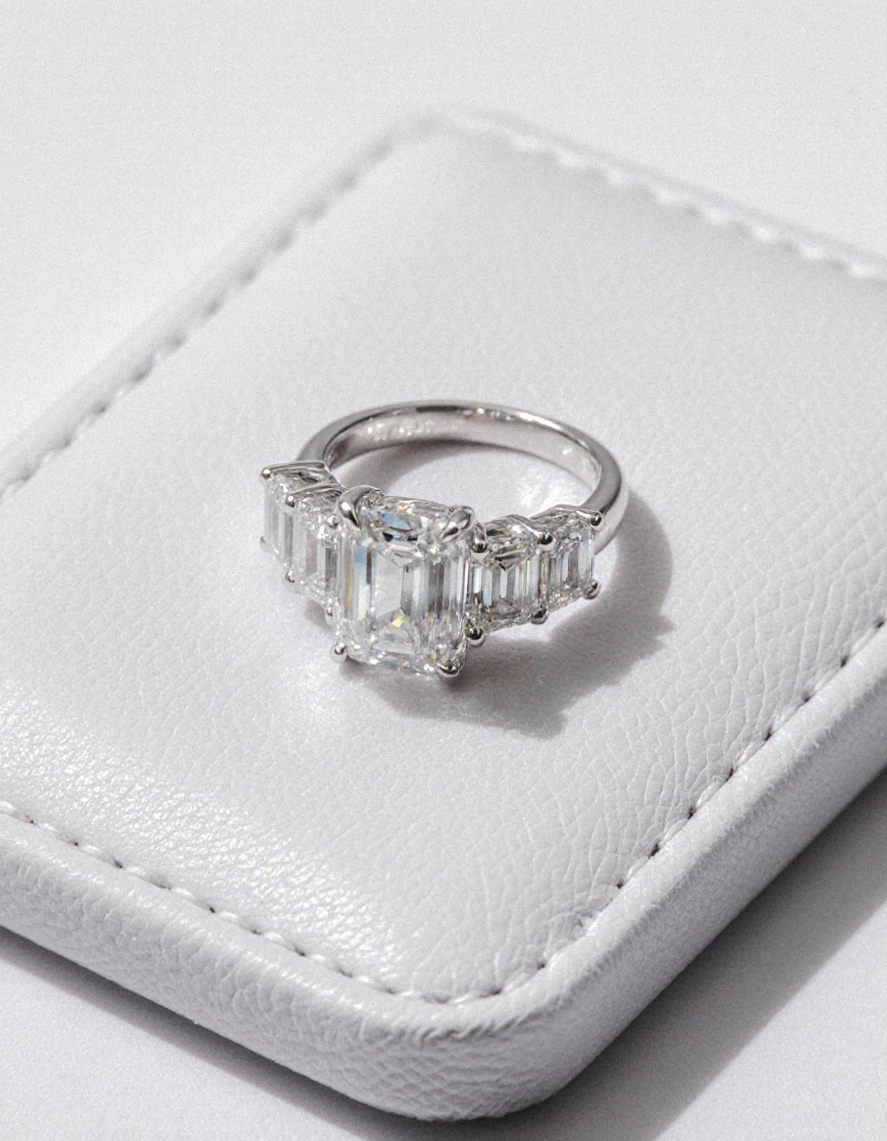 &quot;Rozalin&quot; 7 Stone Emerald cut Graduated Prong Set Engagement Ring