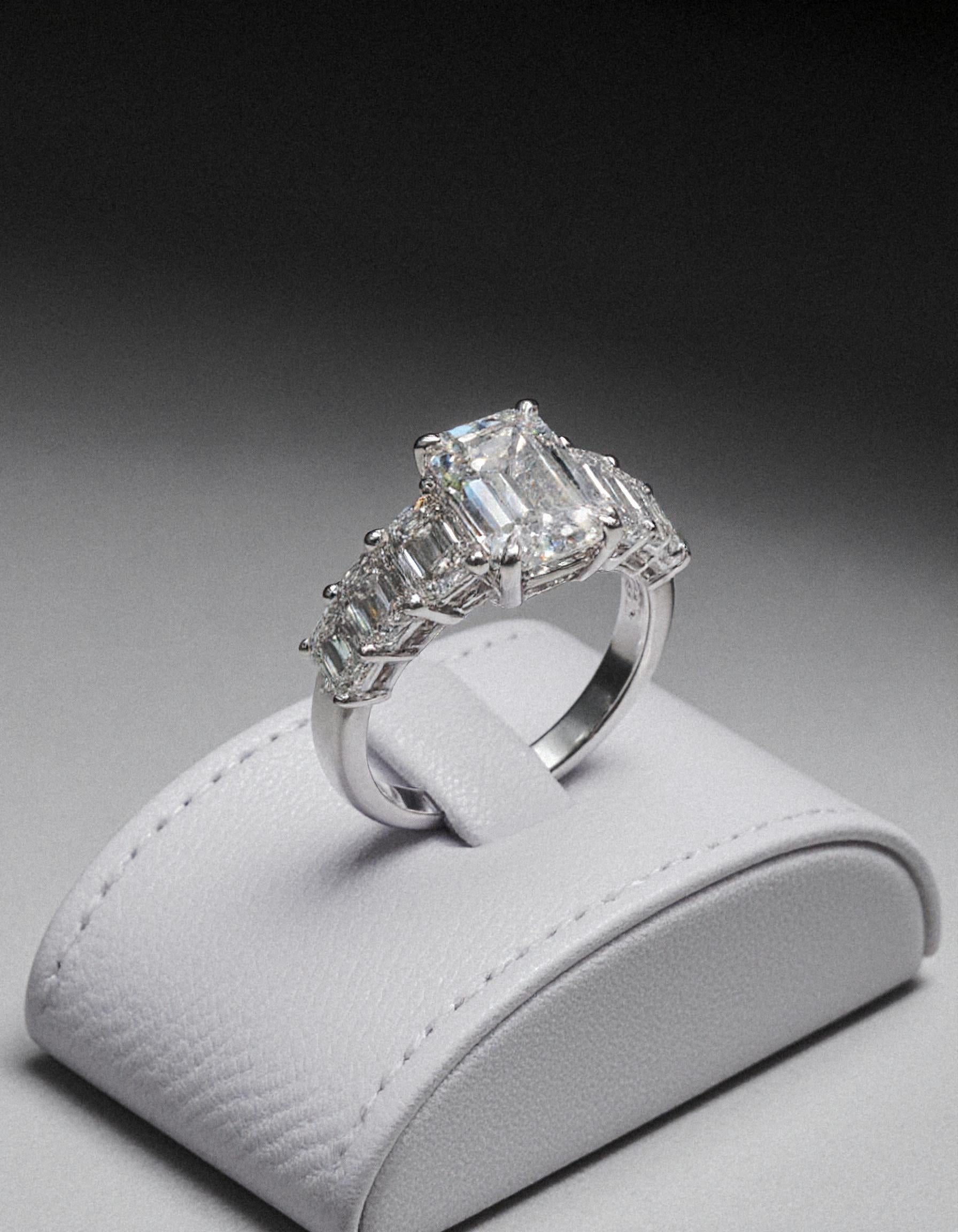 &quot;Rozalin&quot; 7 Stone Emerald cut Graduated Prong Set Engagement Ring