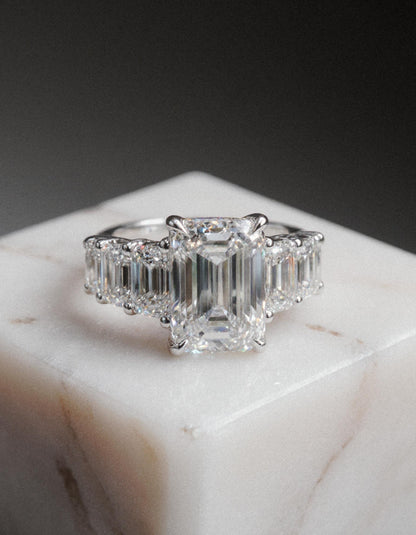 &quot;Rozalin&quot; 7 Stone Emerald cut Graduated Prong Set Engagement Ring